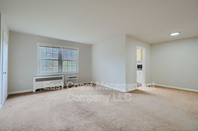 Building Photo - Village Green Condominium