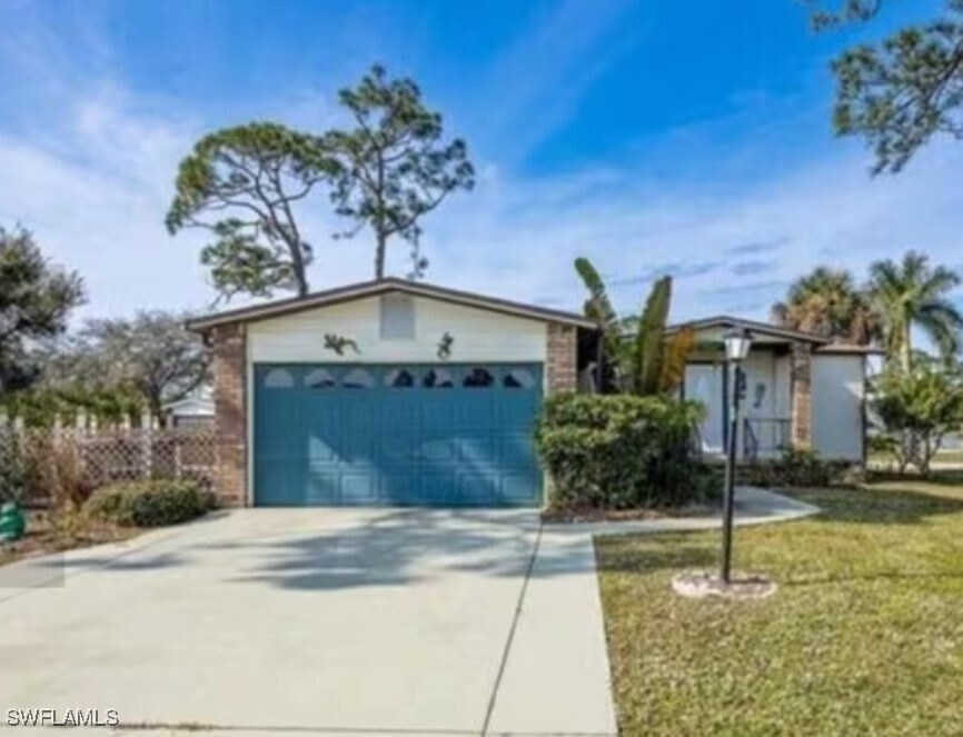 Foto principal - 10091 Broken Woods Ct