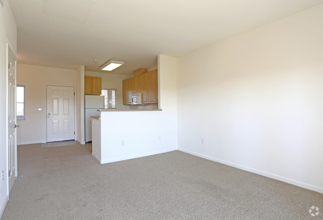 915 SQ 2BD/1BA LIVING RM/KITCHEN - Cornerstone Apartments