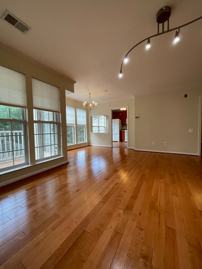 View of the Living Room and Dining Room - 11214 Edson Park Pl