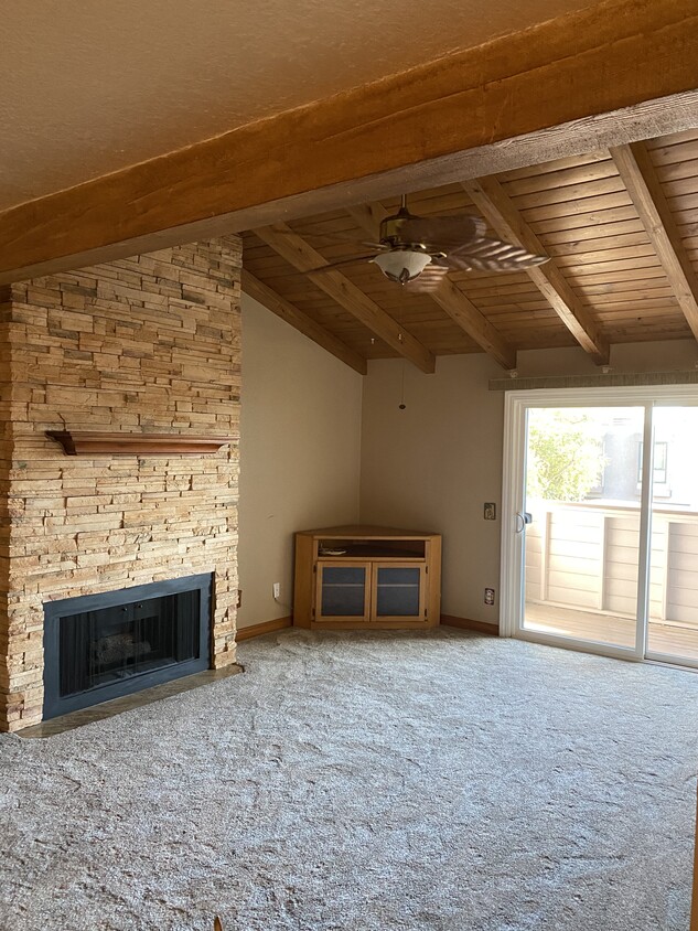 LR view from dining room, new carpet, wood beam ceiling, fireplace ceiling fan/light - 9120 Gramercy Dr