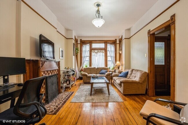 Building Photo - 716 W Briar Pl