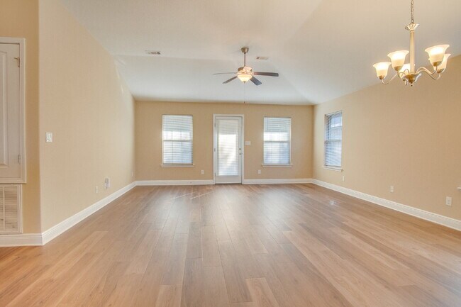 Building Photo - Spacious Brick 3BR/2BA Home with Open Floor Plan, Primary Suite, 2-Car Garage & Fenced Backyard N...