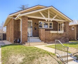 Craftsman brick Highlands home with fenced...