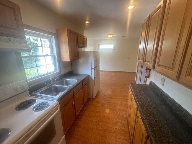 Building Photo - Small Single Family Home With Attached Garage