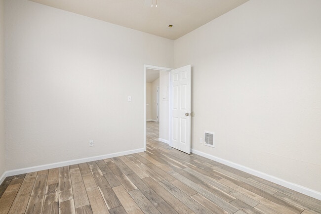 Bedroom exits into the kitchen. - 512 Barrett Ave