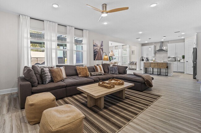 Foto del edificio - "Luxurious Furnished Home with 4-Bed, 3-Bath, Swim Spa Fenced Yard Golf Cart steps to the beach!"