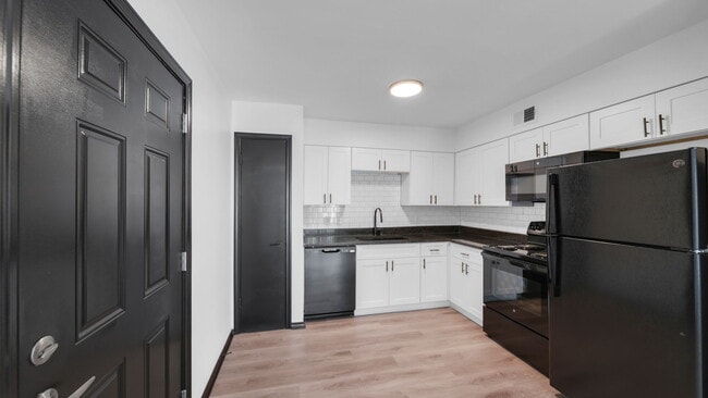 Building Photo - The District Apartments