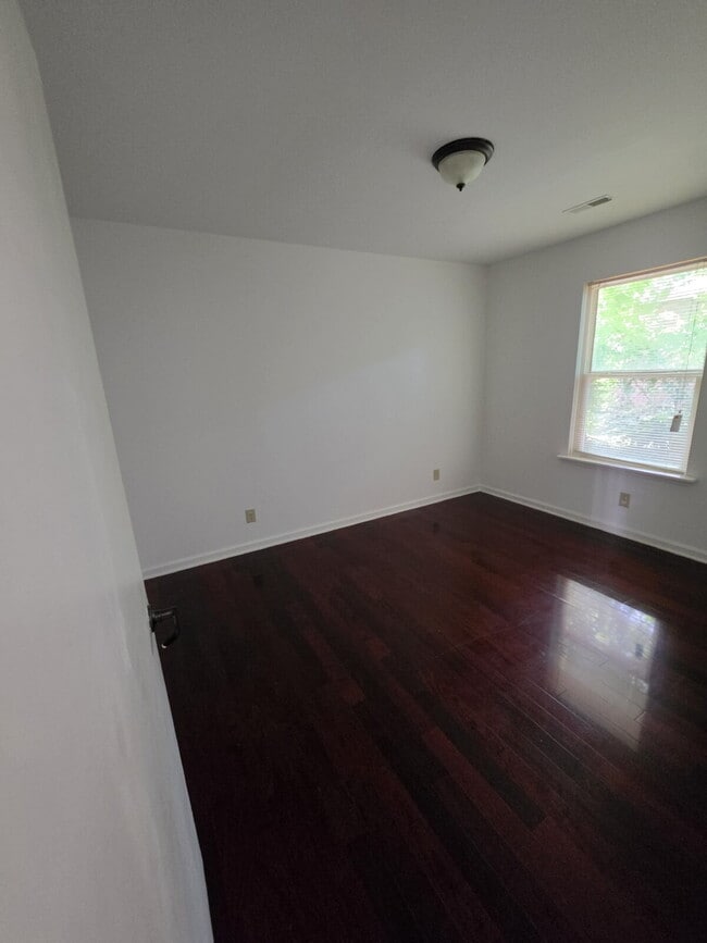 Photo - Comfortable 2-Bedroom Unit with Washer, Dryer & Off-Street Parking Apartment