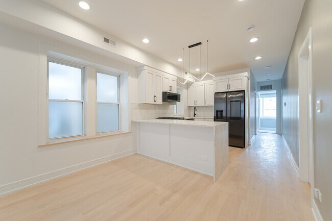 Foto del edificio - 4148 W Wellington Ave