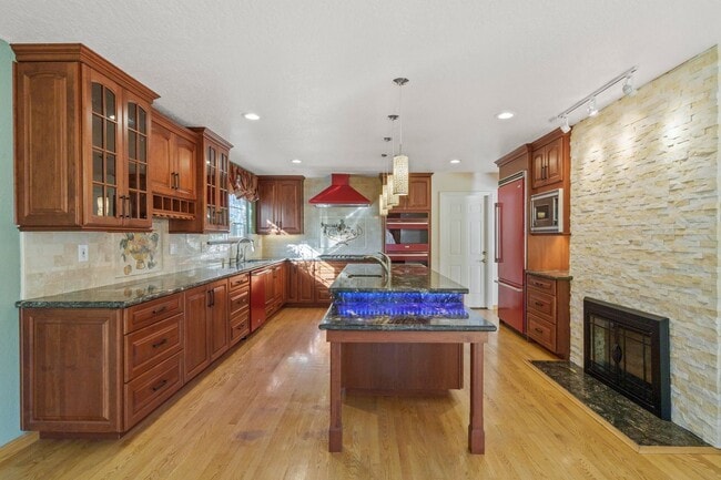 Building Photo - POOL PARADISE IN A COVETED NEIGHBORHOOD STYLISH UPGRADES | EXTREME CONVENIENCE