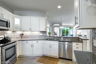 Building Photo - 8385 Excalibur Cir