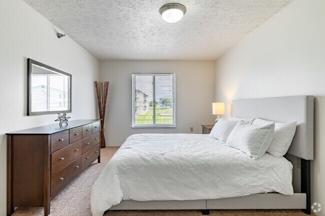 2 habitaciones, 1 baño - 940 pies cuadrados - Dormitorio principal - Woodbury Estates Apartments