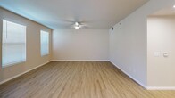Located at 1704 Tonini Dr in San Luis Obispo, CA, this 2-bedroom, 3-bathroom multi-story home is thoughtfully laid out across three levels. The ground level houses an attached garage equipped with a garage door opener, overhead lighting, built-in shelving, and additional storage space.

The main living level is the heart of the home, featuring an open-concept layout that connects the kitchen, dining area, and living room. The kitchen is outfitted with light wood cabinetry, a gas range, built-in microwave, dishwasher, a double-basin sink set in an L-shaped counter configuration, and a skylight that fills the space with natural light. The adjacent living room is bright and open, with light wood-style flooring, neutral-toned walls, and sliding glass doors leading to a patio. A second living area on this floor provides additional flexible space.

Upstairs, two bedrooms offer comfortable retreats, each featuring ceiling fans, light wood flooring, and ample natural light from windows with blinds. The primary bedroom includes a mirrored sliding-door closet. Three well-appointed bathrooms are distributed throughout the home, each featuring tub/shower combinations, light wood vanities, and clean, neutral finishes. A dedicated laundry area and multiple closets round out the functional layout of this well-designed San Luis Obispo home.