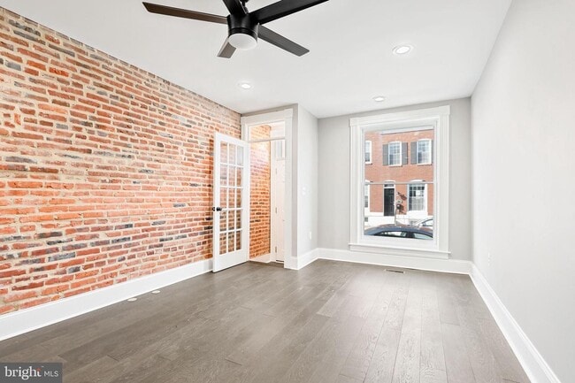 Living Room showing Entryway/Mudroom, Huge Windows (2 of 2) - 263 S Robinson St