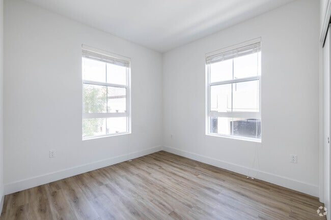 3BR, 2BA - 1,295SF - Bedroom - Lumia Apartments