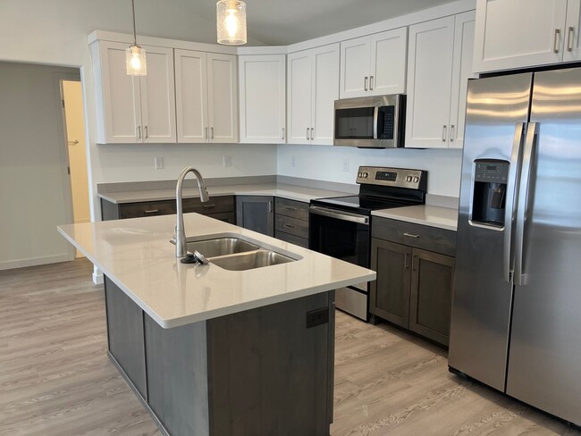 Building Photo - New 4 Bedroom/3 Bathroom Twin Home