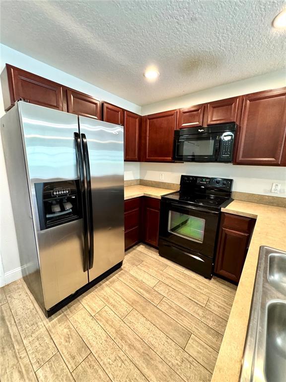 Building Photo - 13418 Tea Rose Way