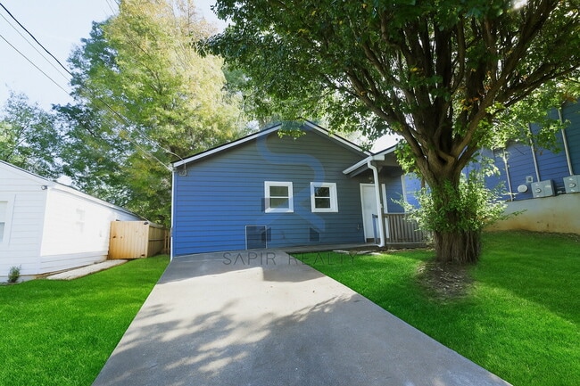 Building Photo - LIMITED-TIME OFFER! Apply today with NO APPLICATION FEE! Terms apply. Call (678) 487-7896, Option...