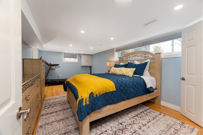 Enjoy restful sleep with blackout blinds that keep the room dark and cozy. - 1191 Pharmacy Av