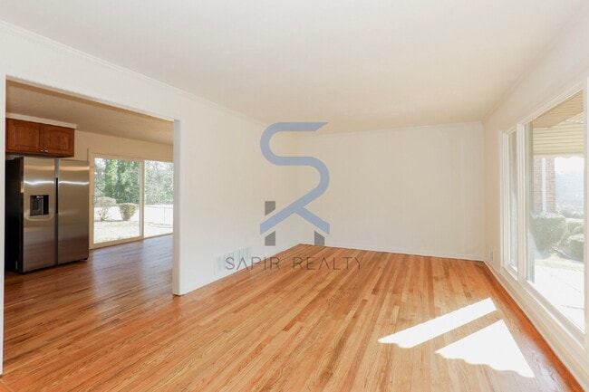 Building Photo - Move in before February 28th and choose your reward: a $250 Amazon Gift Card or a 55" Smart TV!