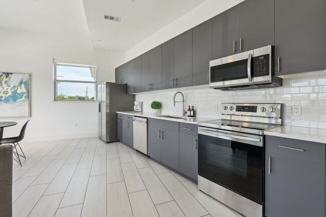 Building Photo - Modern 1 Bedroom in The Cedars