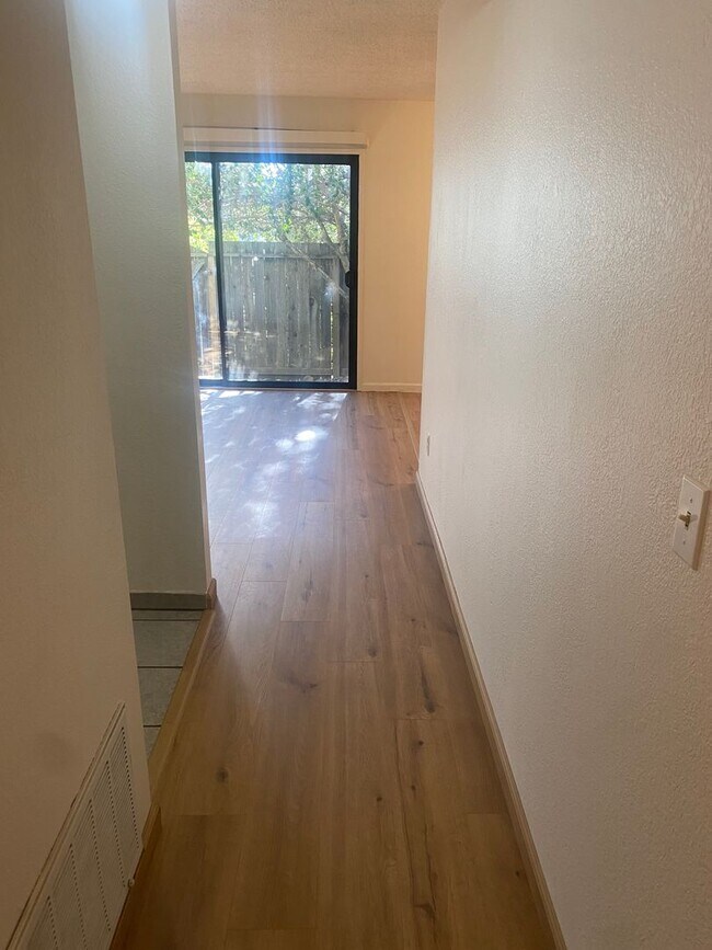 Building Photo - New Flooring in this 2 bedroom 1 bathroom ...
