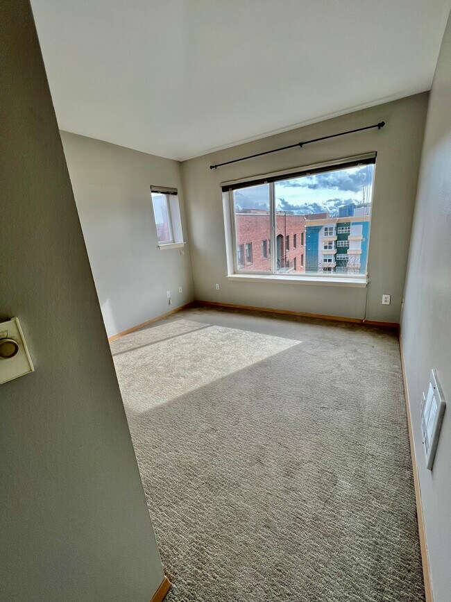Bedroom 1- large picture window - 712 E Denny Way