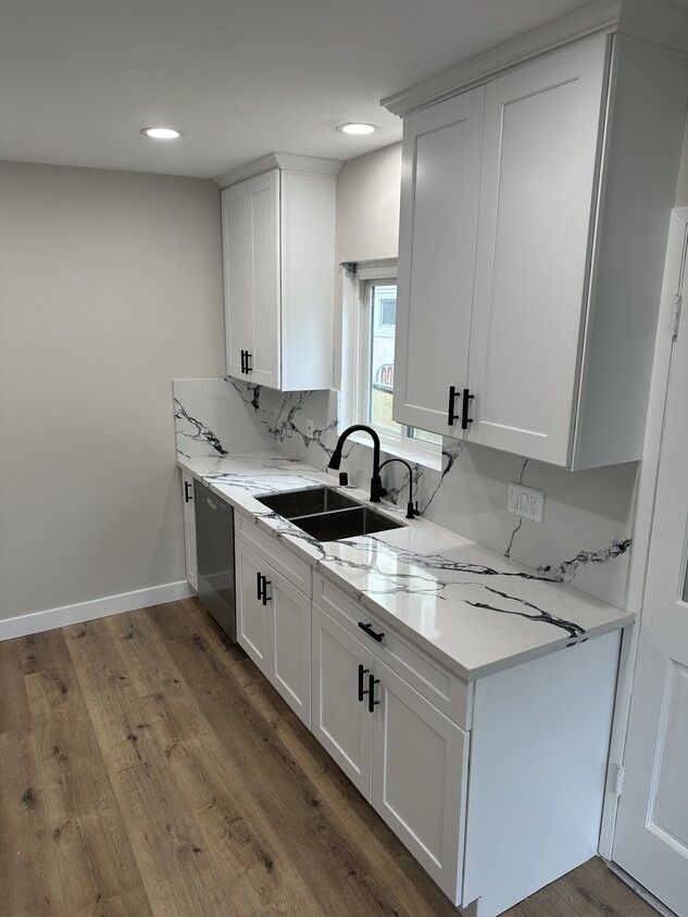 Brand new kitchen cabinets, countertops, fixtures, faucet with purified water filter dispenser. - 4230 W 169th St