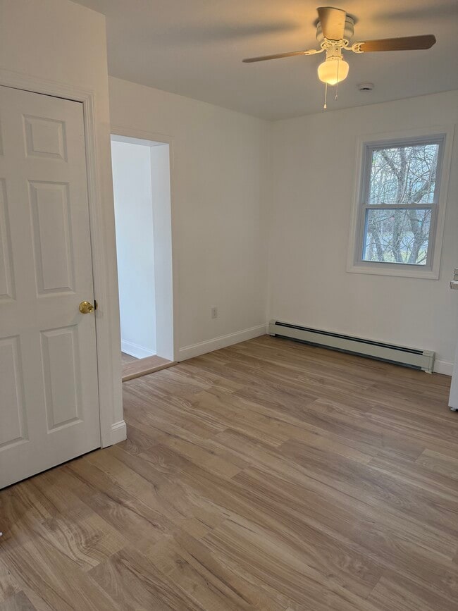 Living room with coat closet. - 410 E Point Pleasant Ave