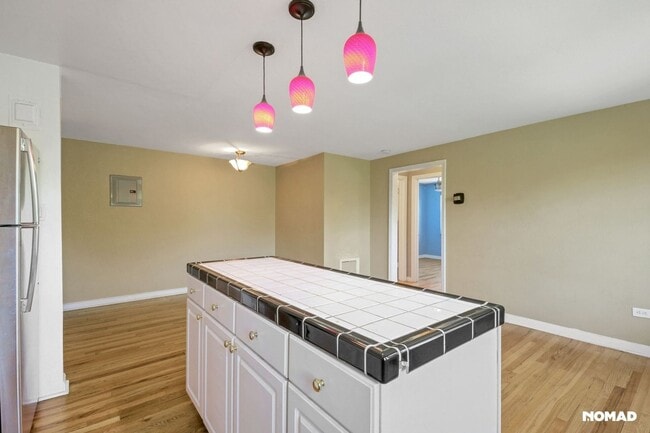 Building Photo - Charming 2BR Condo in Denver