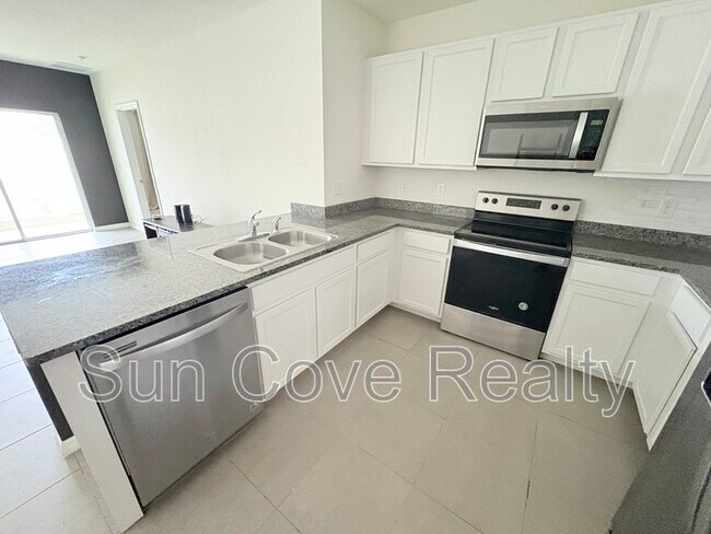 Foto del edificio - 3180 Suncoast Plains Dr