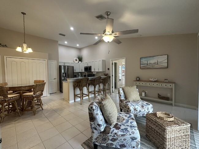 Building Photo - "Charming 2-Bed, 2-Bath Furnished Condo Oa...