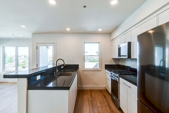 Building Photo - Now Leasing at The Gardens on Bancroft – W...