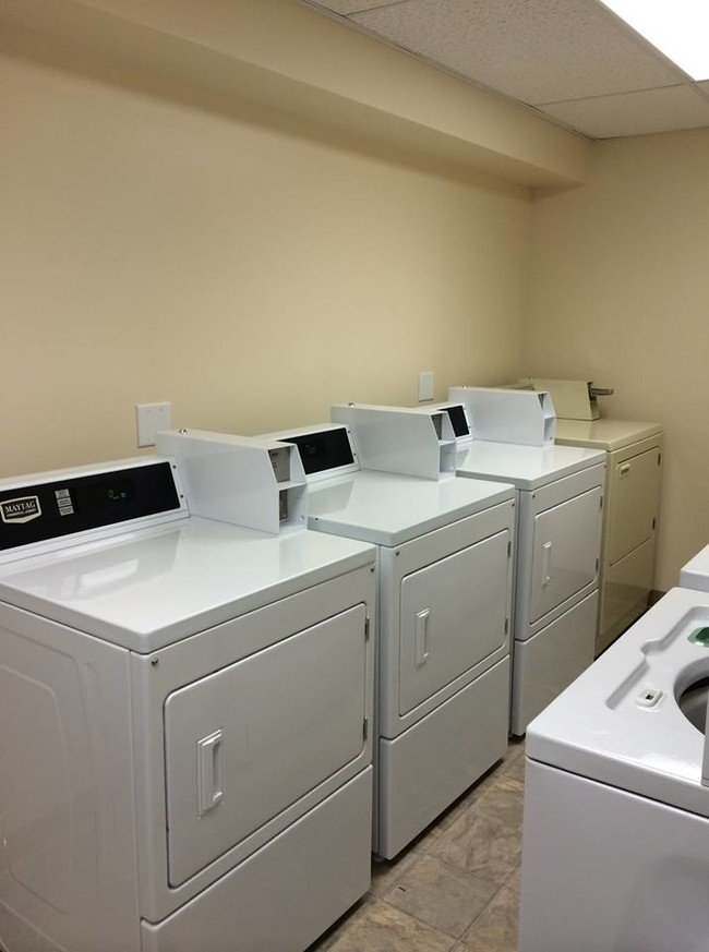 On-Site Laundry - Courtyard Apartments, LLC.