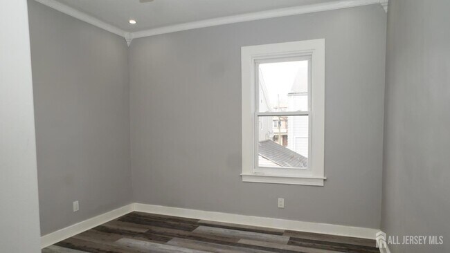 Building Photo - 65 Poe Ave