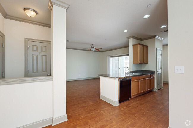 3BR, 2BA - 1,378SF - Kitchen Area & Living Room - The Lakes At Turtle Creek Apartment Homes