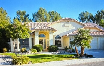 Building Photo - 9411 S Palm Dr