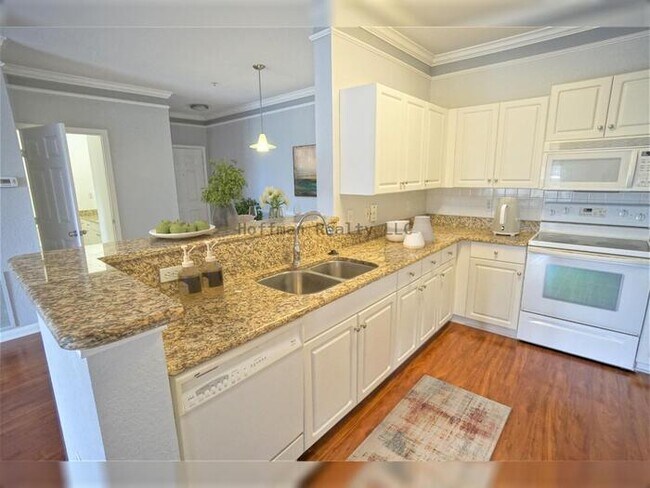 Building Photo - Beach Walk Condo | 2BR/2BA with Bay Views