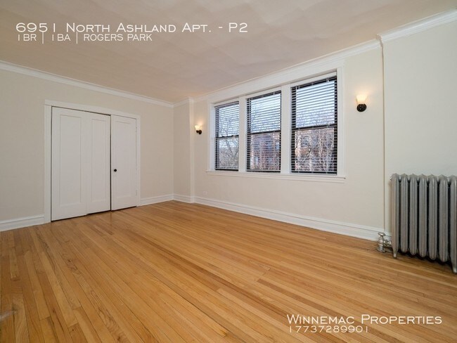 Foto del edificio - 6951 N Ashland Blvd
