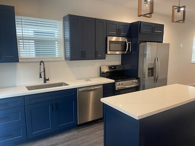 Foto del edificio - Brand new 2 bed/2 bath, central a/c, dishwasher, washer & dryer, deck & patio!