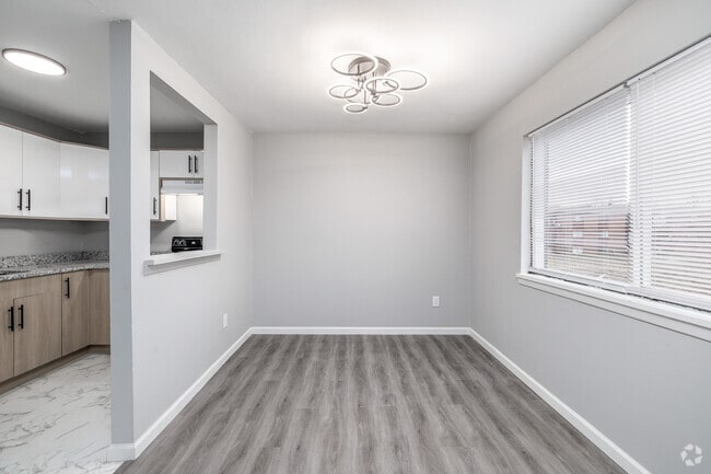 2BR, 1BA - 910SF - Dining Room - Lansing Grove Apartments