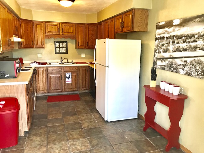 Kitchen filled with everything you need for dining in. - 502 Crab Apple Court