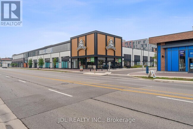 Photo du bâtiment - 215-215 Lakeshore Rd W