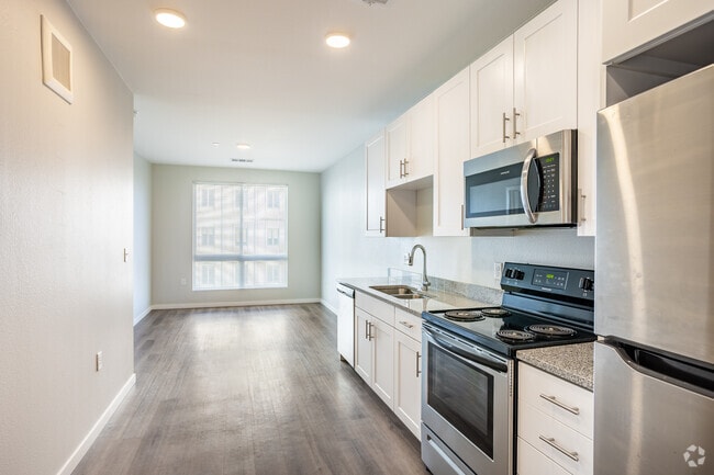 1BR, 1BA - 620SF - Kitchen / Living Room - Capitol Square Apartments