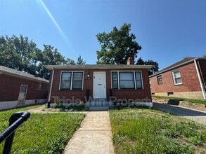 Building Photo - 8334 Elmore Ave