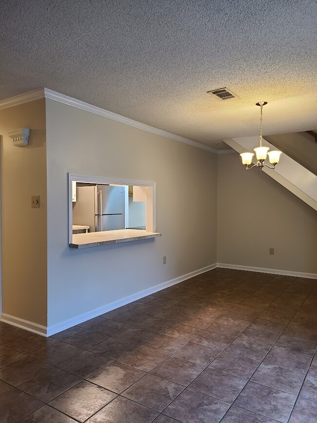 Kitchen passthrough to Dining - 12435 Coursey Blvd