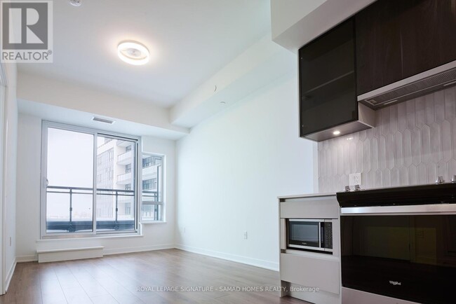Photo du bâtiment - 395-395 Dundas St W