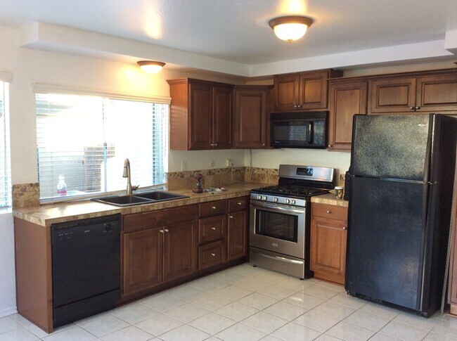 Building Photo - HIGHLY DESIRED, UPGRADED TOWNHOME W/ PATIO...