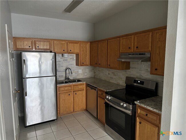 Foto del edificio - 5204 Daybreak Dr